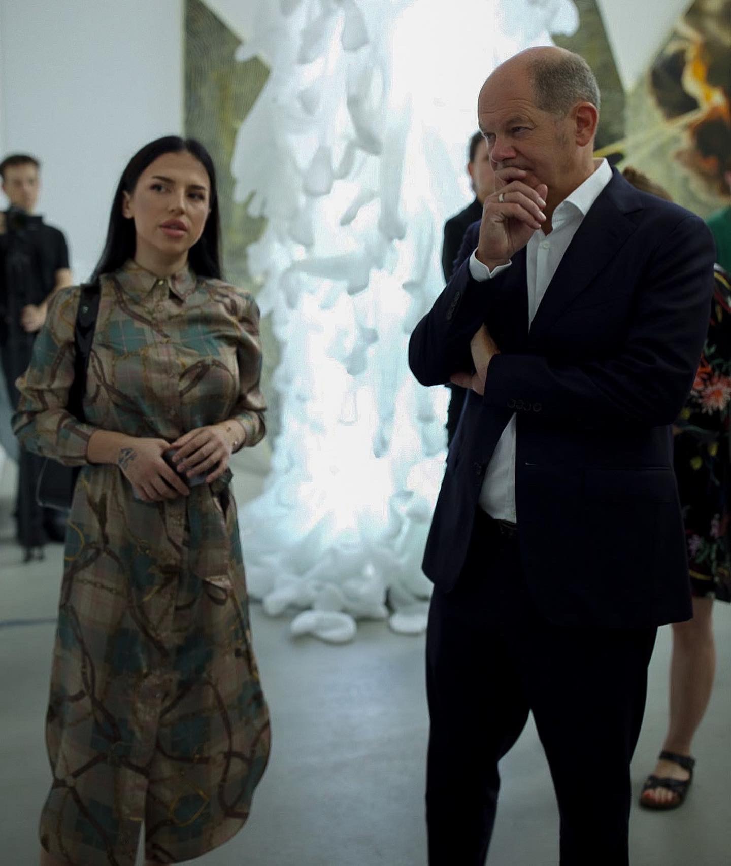 Anna Moskalets stands with the former Chancellor of Germany, Olaf Scholz at “Lacuna” project exhibition in Potsdam, Germany.